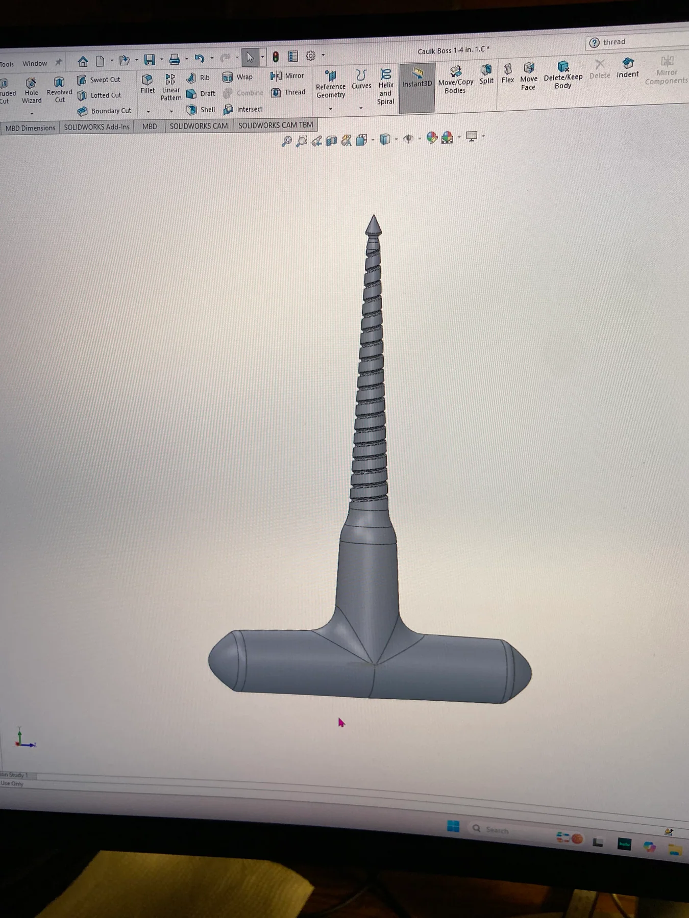 Revised CAD model of the tool with a threaded stepped shaft