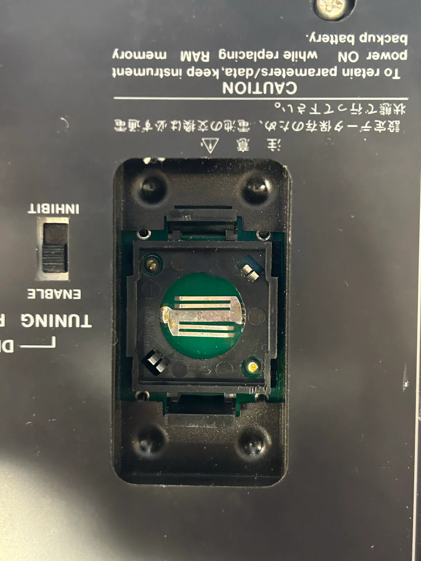 Original battery tray installed in the instrument battery bay