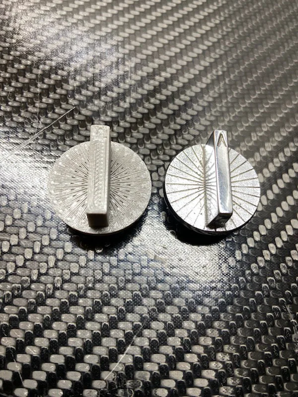 Rear detail of the printed and original control knobs